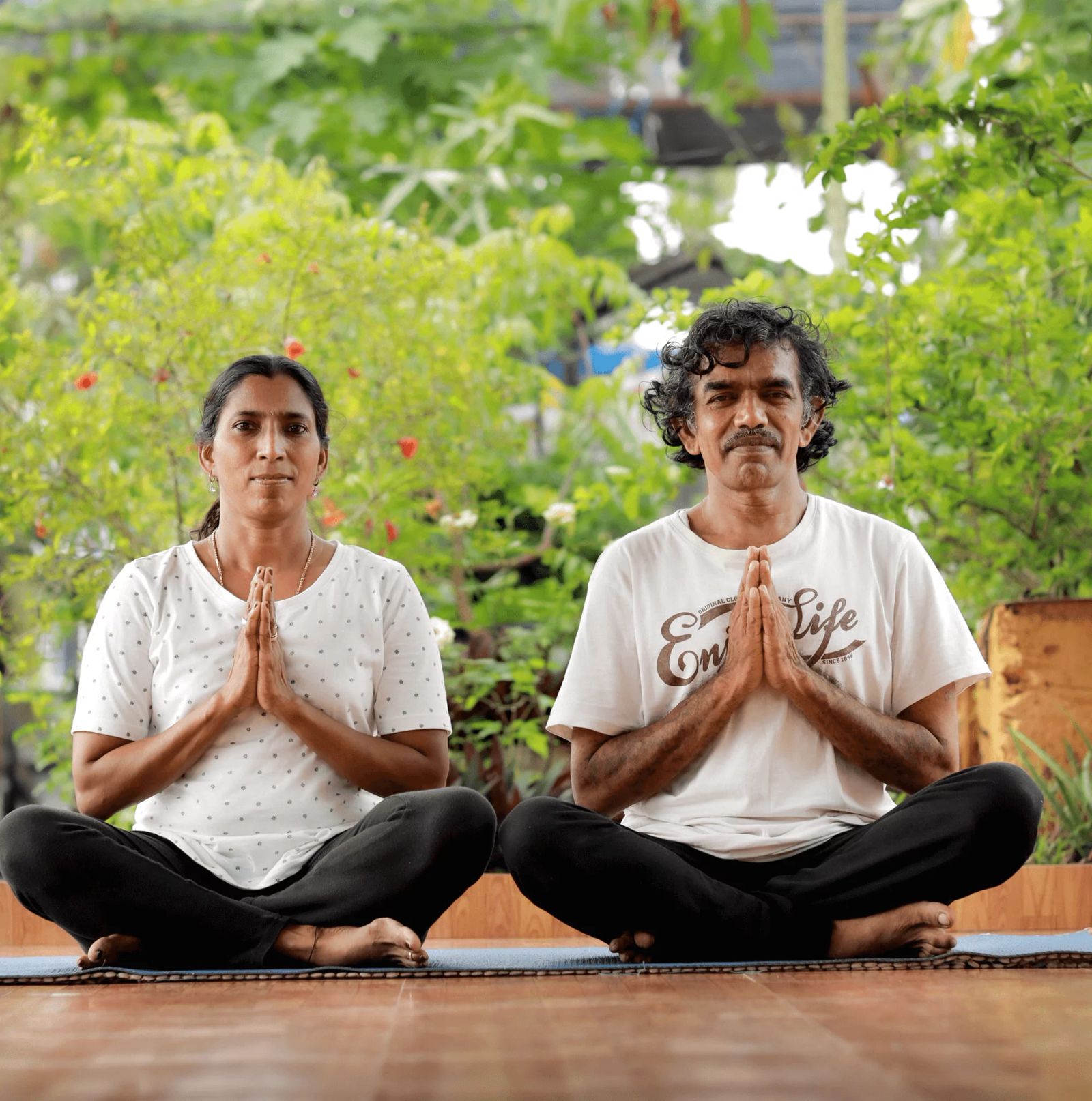 Anitha and Ramesh, the founders of Ayurtheeram, seated in meditation