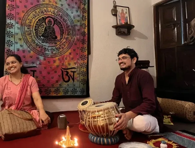 Music and meditation session with live tabla and a singer by candlelight